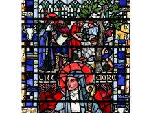St. Brigid of Kildare building the Church of the Oak, detail from a window of St Etheldreda's church in London.
