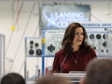 Michigan Governor Gretchen Whitmer signs a state budget in Lansing, Mich., Sept. 29, 2021.