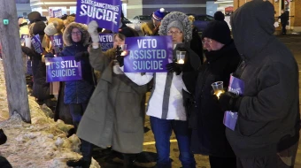 Disabilities advocates in Buffalo, New York, during a candlelight vigil in opposition to assisted suicide.