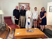 Bishop Michael Burbidge of Arlington, Virginia (center), at his blessing of Mary’s Comfort maternity home on Aug. 9, 2024. More maternity homes are popping up across the United States to house and support pregnant mothers and their babies since Roe v. Wade was overturned by the U.S. Supreme Court in 2022. 