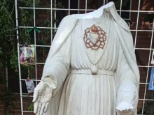A desecrated statue of the Blessed Virgin Mary at Holy Family Parish in Citrus Heights, California. 