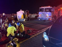 First responders provide aid after a bus carrying a group of mostly teenagers from Our Lady of Guadalupe Catholic Church in Santa Ana, California, on its way home from a three-day retreat at Camp Nawakwa in the San Bernardino Mountains crashed on a two-lane highway near Running Springs on Nov. 9, 2025.