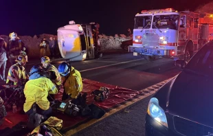 First responders provide aid after a bus carrying a group of mostly teenagers from Our Lady of Guadalupe Catholic Church in Santa Ana, California, on its way home from a three-day retreat at Camp Nawakwa in the San Bernardino Mountains crashed on a two-lane highway near Running Springs on Nov. 9, 2025. Credit: Photo courtesy of the San Bernardino County Fire Protection District