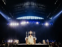 Bishop Andrew Cozzens of Crookston, Minnesota, who spearheaded the U.S. bishops’ initiative of Eucharistic Revival, adores Christ in the Eucharist with tens of thousands of people in Lucas Oil Stadium.