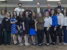 The first round of graduates of the Catholic Educational Leadership Cohort pictured with Superintendent Jim Rigg (back, middle) and David Armstrong (back, right) at graduation celebration on Jan. 10, 2025.