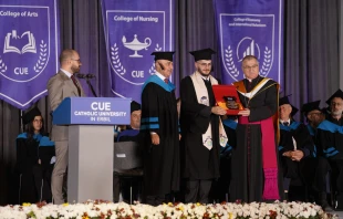 A student receives his diploma during a graduation ceremony at the Catholic University of Erbil in Iraq on Sept. 30, 2025. Credit: ACI MENA