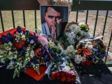 A general view of a wreath laid by mourners outside the U.S. Embassy in Pretoria on Sept. 11, 2025, following the fatal shooting of U.S. youth activist and influencer Charlie Kirk while speaking during an event at Utah Valley University in Orem, Utah.