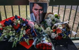 A general view of a wreath laid by mourners outside the U.S. Embassy in Pretoria on Sept. 11, 2025, following the fatal shooting of U.S. youth activist and influencer Charlie Kirk while speaking during an event at Utah Valley University in Orem, Utah. Credit: PHILL MAGAKOE/AFP via Getty Images