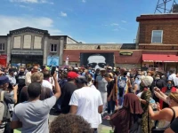 Faith leaders pray June 2 at the spot where George Floyd died.