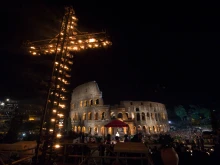 Pope Francis prays the Stations of the Cross at the Colosseum in Rome, Italy, on Good Friday, April 14, 2017.