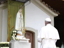 Pope Francis prays at the Sanctuary of Our Lady of Fatima in Portugal on May 12, 2017.