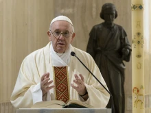 Pope Francis celebrates Mass in the chapel of the Casa Santa Marta on May 1, 2020, the feast of St. Joseph the Worker.