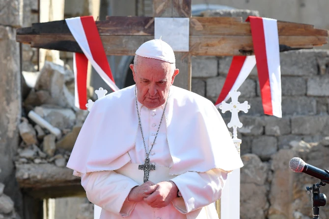 Pope Francis prays at Hosh al-Bieaa (Church square) in Mosul, Iraq, on March 7, 2021.