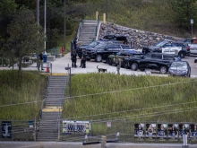 Police officers are on the scene at Evergreen High School where a shooting occured earlier in the day, in Evergreen, Colorado, on Sept. 10, 2025. A shooting at Evergreen High School in Colorado critically injured three studentsincluding the suspected shooter. Authorities say there is no longer an active threat.