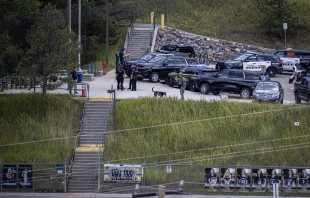 Police officers are on the scene at Evergreen High School where a shooting occured earlier in the day, in Evergreen, Colorado, on Sept. 10, 2025. A shooting at Evergreen High School in Colorado critically injured three studentsincluding the suspected shooter. Authorities say there is no longer an active threat. Credit: CHET STRANGE/AFP via Getty Images