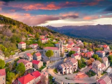 The sun rises over the island of Corsica, France.