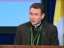 Bishop-designate Andrew H. Cozzens of Crookston, Minn., speaks to the general assembly of the United States Conference of Catholic Bishops on Nov. 17, 2021, in Baltimore.