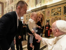 Pope Francis meets participants in an international conference of moral theology in the Vatican’s Clementine Hall, May 13, 2022.
