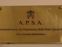 The banner at the entrance of the APSA office in the Vatican .- 