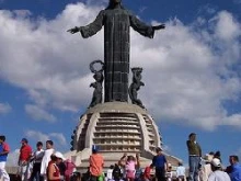 The statue of Christ the King on top of the mountain
