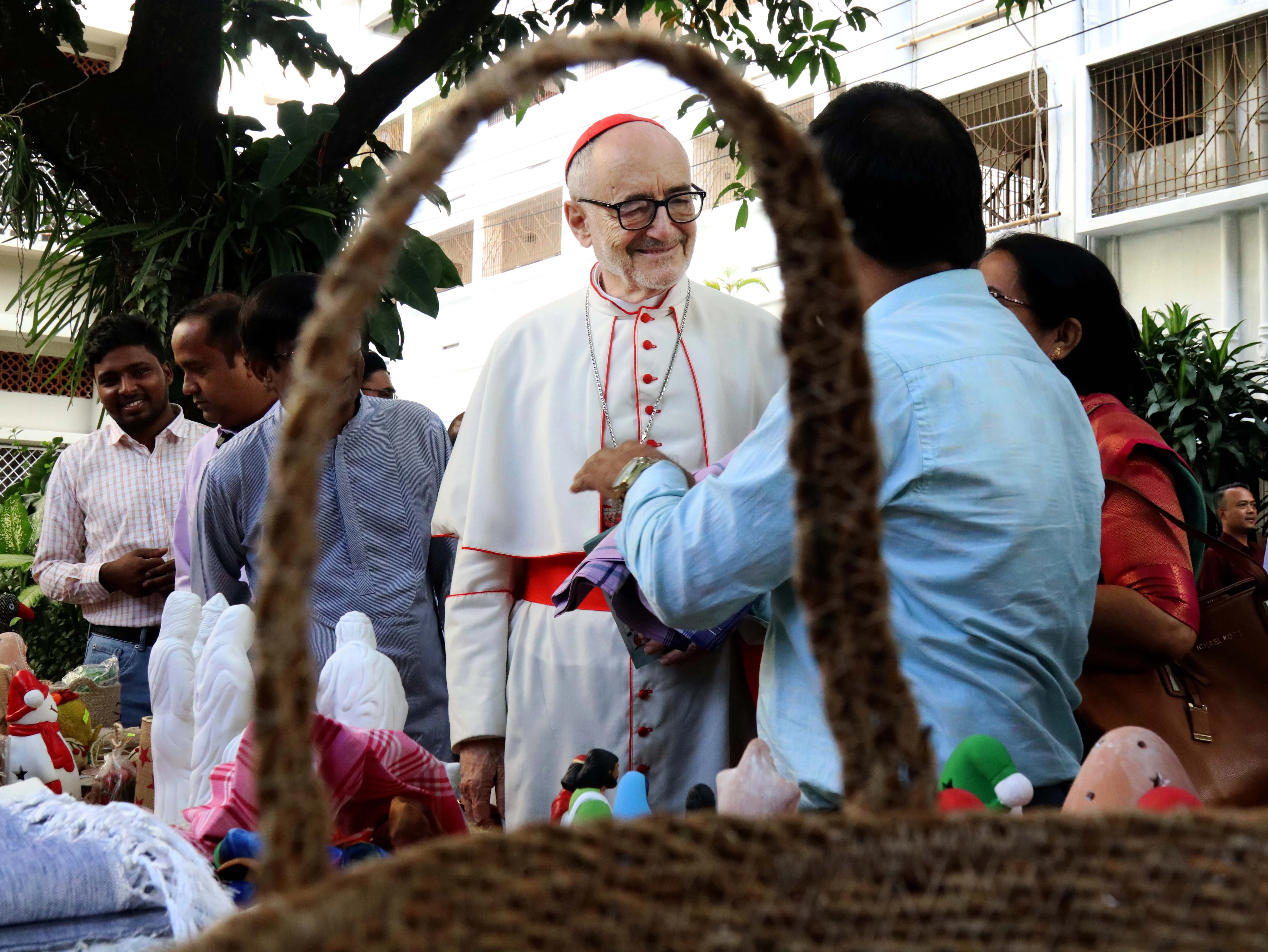 Cardinal Michael Felix Czerny, SJ, head of the Dicastery for Promoting Integral Human Development, visits a stall of Caritas Bangladesh on Nov. 4, 2025, in Dhaka.?w=200&h=150