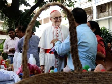 Cardinal Michael Felix Czerny, SJ, head of the Dicastery for Promoting Integral Human Development, visits a stall of Caritas Bangladesh on Nov. 4, 2025, in Dhaka.