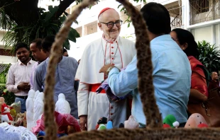 Cardinal Michael Felix Czerny, SJ, head of the Dicastery for Promoting Integral Human Development, visits a stall of Caritas Bangladesh on Nov. 4, 2025, in Dhaka. Credit: Stephan Uttom Rozario