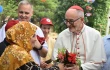 Cardinal Michael Czerny, SJ, receives flowers from Rohingya during his visit to Cox’s Bazar, considered the world’s largest refugee camp, on Sunday, Nov. 3, 2025.