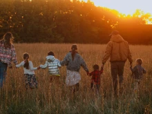 A behind-the-scenes photo of the Darrows filming “The Cultivation of Purpose with Leah Darrow: Faith, Farming and Vocation” on their Missouri farm.
