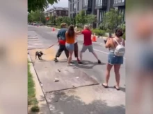 A male suspect grabs sidewalk counselor Mike Gribbin outside of a Washington, D.C., Planned Parenthood clinic July 22, 2023.