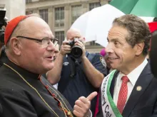 Cardinal Timothy Dolan & Governor Andrew Cuomo attend 2017 Columbus Day parade. lev radin / Shutterstock