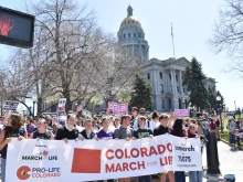 Students from local schools lead the Colorado March for Life at the state capitol on April 11, 2025.