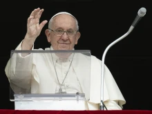 Pope Francis greets the crowd at his Regina Caeli address on May 14, 2023.