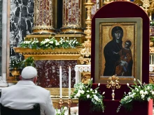 Pope Francis venerates the Salus Populi Romani icon in the Basilica of St. Mary Major on Dec. 8, 2023.