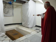 The coffin of Pope Benedict XVI is prepared for interment in the crypt of St. Peter's Basilica on Jan. 5, 2023.