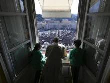 Pope Francis delivers the Sunday Angelus from the window of his study overlooking St. Peter's Square, Jan. 28, 2024.