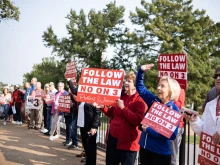 Pro-life protestors hold signs outside the Missouri Supreme Court on Sept. 10, 2024, advocating against Amendment 3, which would have dramatically expand abortion access in Missouri.