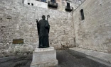 Statue of St. Nicholas, the patron saint of Bari, Italy, at the Pontifical Basilica of St. Nicholas.