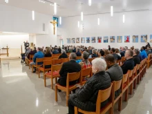 Loyola High School alumni, students, and school benefactors gather in the new St. Peter Claver Chapel on Wednesday, April 2, 2025. The chapel features sacred items donated from various churches in the Archdiocese of Detroit.