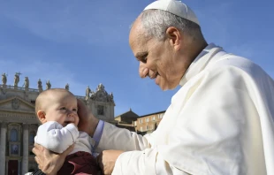 Pope Leo XIV blesses a baby on All Saints Day’ 2025. Credit: Vatican Media