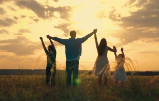 A family says good-bye to summer and welcomes the fall. Credit: Zoteva/Shutterstock
