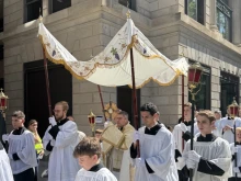 The Blessed Sacrament is held aloft during a Eucharistic procession through Washington, D.C., Saturday, May 17, 2025.