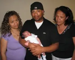 Left to Right: Martha Motley, Jovan with his son, and Esmeralda Abreu, the mother of Benny.  Photo ?w=200&h=150