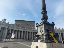 Bouquets of flowers are left by visitors to St. Peter's Square on Easter Monday following the news of the death of Pope Francis, Monday, April 21, 2025.