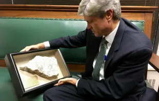 Congressman Jeff Fortenberry holds a fragment of an Iraqi Christian altar destroyed by the Islamic State. Courtesy photo 