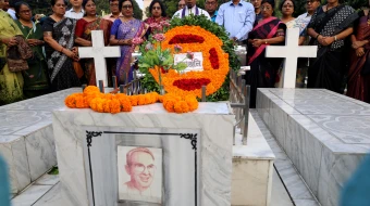 Leaders of the Christian community lay wreaths at the grave of Father Charles Joseph Young at the Holy Rosary Church cemetery in Dhaka on Nov. 14, 2025.