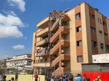 Palestinians gather outside Nasser Hospital in Khan Yunis in the southern Gaza Strip on Aug. 25, 2025, following Israeli strikes.
