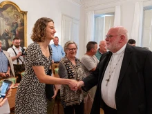 Cardinal Reinhard Marx meets with a delegation from the Italian village of Filetto di Camarda in his residence in Munich on July 9, 2023.