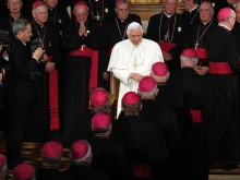 Bishops of England, Scotland, and Wales line up to kiss Pope Benedict XVI's ring at Oscott College in Birmingham, central England, on Sept. 19, 2010, where he later addressed bishops.