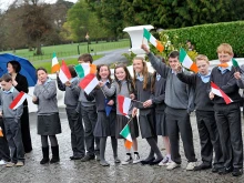 Schoolchildren attend a ceremonial welcome and tree planting at Aras an Uachtarain, the official residence of the president of Ireland, during a state visit by His Serene Highness Prince Albert II of Monaco and his fiancee, Charlene Wittstock, on April 4, 2011, in Dublin.